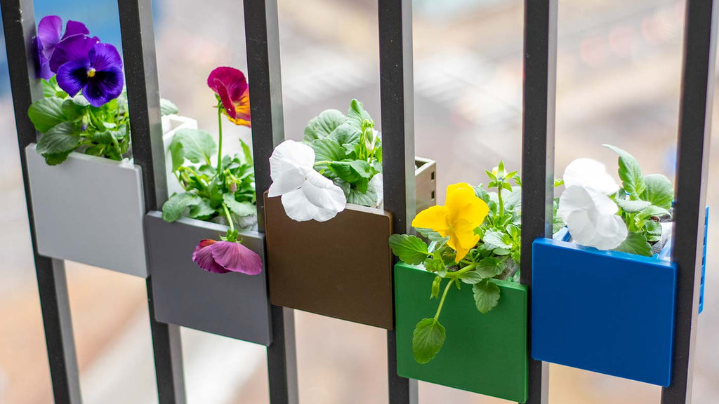Close Up of Sprout Railing Planter in Multiple Colors on Balcony Railing